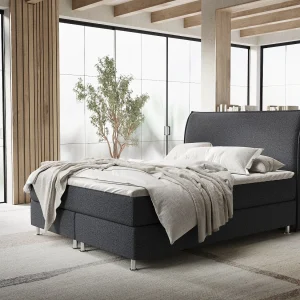 Boxspringbed met hoofdeinde van geweven stof – Chermin – matras en dekmatras – 140×200 cm – zwart