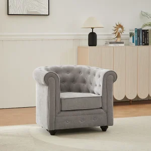 Grijze stoffen fauteuil in de legendarische CHESTERFIELD-vorm Grijze stoffen fauteuil in de legendarische CHESTERFIELD-vorm