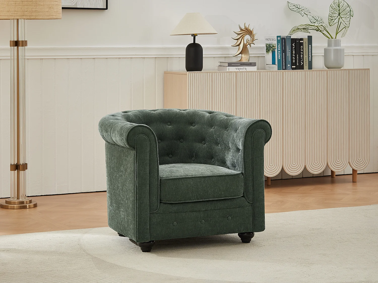 Groene stoffen fauteuil in de mythische CHESTERFIELD vorm