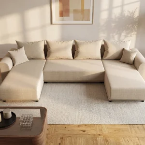 Brede hoekslaapbank van beige stof NESSARO